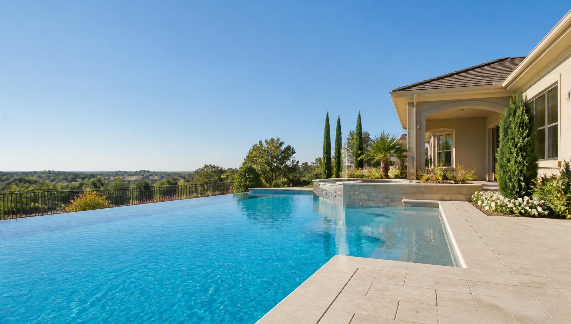 A pristine backyard swimming pool with clear blue water
